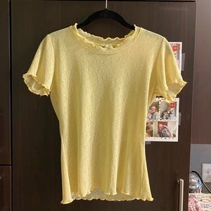 Sheer yellow lettuce edge top